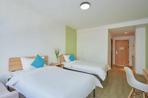 Fotografie z fotogalerie ubytování DuoDuo Hotel Apartment - Yiwu International Trade City v destinaci I-wu