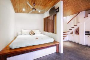 Posteľ alebo postele v izbe v ubytovaní Coral Sands & Coral Sea at Bingin