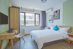 Fotografie z fotogalerie ubytování DuoDuo Hotel Apartment - Yiwu International Trade City v destinaci I-wu