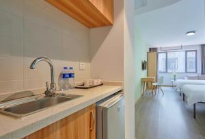 Fotografie z fotogalerie ubytování DuoDuo Hotel Apartment - Yiwu International Trade City v destinaci I-wu