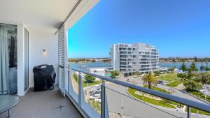 a balcony with a view of the water at Bayview 608 in Mandurah