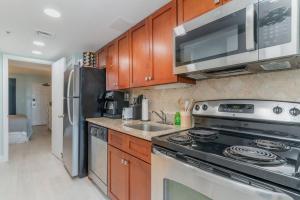 Η κουζίνα ή μικρή κουζίνα στο Ocean Breeze