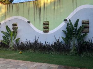 a wall with a painting of a road on it at OPEN HOUSE VARGAS in São Paulo