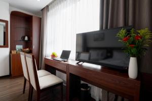 TV o dispositivi per l'intrattenimento presso Dao Ngoc Hotel Da Nang