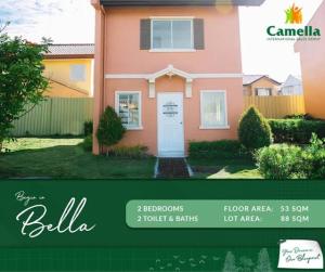 a picture of a pink house with a sign for bill at Camella homes laoag city ilocos norte in Bangued