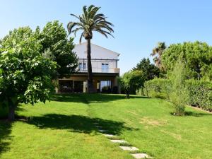 Zahrada ubytování Villa pieds dans l'eau pour 10 personnes avec piscine, clim et Wi-Fi - FR-1-768-27