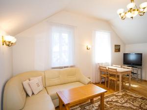 TV a/nebo společenská místnost v ubytování Aparte Lux
