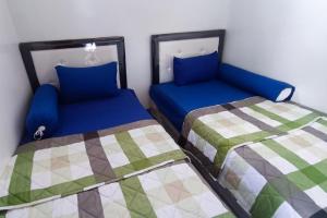 Krevet ili kreveti u jedinici u okviru objekta SPOT ON 93317 Wisma Ratu Syariah