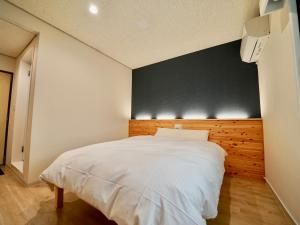 Hotel Ishigaki and Chikonkiya客房内的一张或多张床位