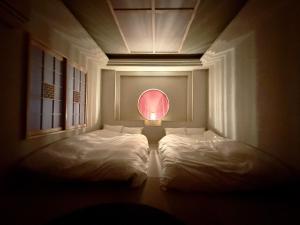 Hotel Ishigaki and Chikonkiya客房内的一张或多张床位