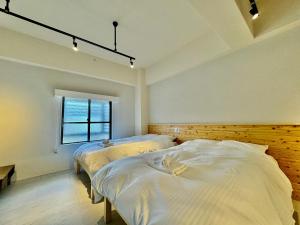 Hotel Ishigaki and Chikonkiya客房内的一张或多张床位