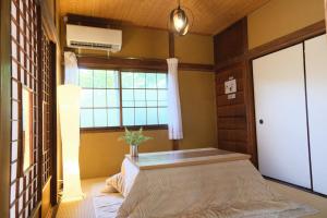 Postel nebo postele na pokoji v ubytování 12月NEWOPEN 鎌倉House 響 ペットと泊まれる北鎌倉4LDK貸別荘