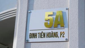 a sign on a building with the on it at Milan Homestay - Milanesa Hotel and Apartment in Vung Tau