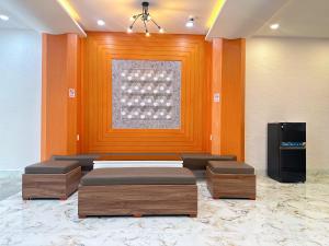 a room with two beds and a window in it at Milan Homestay - Milanesa Hotel and Apartment in Vung Tau