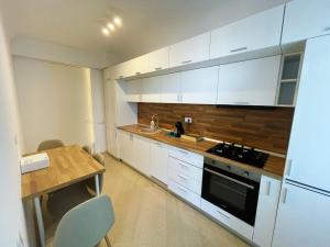 Kuchyň nebo kuchyňský kout v ubytování Luxury Apartment Wellness + 1 fotografie