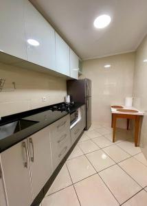 Kuchyň nebo kuchyňský kout v ubytování appartement chams