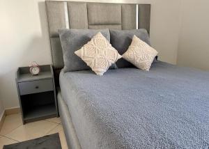 Postel nebo postele na pokoji v ubytování appartement chams