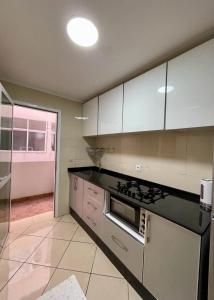 Kuchyň nebo kuchyňský kout v ubytování appartement chams