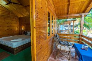 Postel nebo postele na pokoji v ubytování Hitide Beach Resort