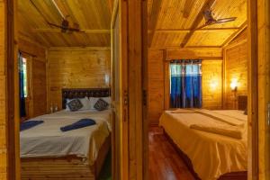 Postel nebo postele na pokoji v ubytování Hitide Beach Resort