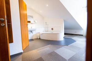 Kuchyň nebo kuchyňský kout v ubytování Hotel Darstein