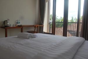 Voodi või voodid majutusasutuse L'JAVAS VILLAS toas