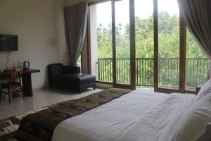 Voodi või voodid majutusasutuse L'JAVAS VILLAS toas