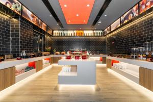 Istumisnurk majutusasutuses Ibis Styles Hotel - 260M from Guangji Street Subway Station