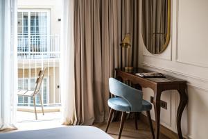 Letto o letti in una camera di Palazzo Castagna Boutique Hotel