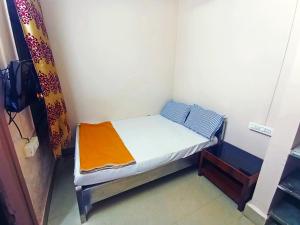 Jayalaxmi Comforts客房内的一张或多张床位