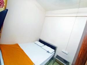 Jayalaxmi Comforts客房内的一张或多张床位