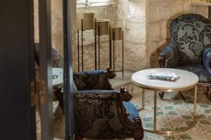Area soggiorno di Palazzo Castagna Boutique Hotel