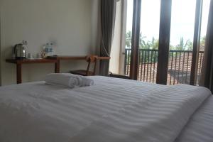 Voodi või voodid majutusasutuse L'JAVAS VILLAS toas