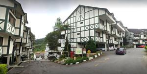 a building with a car parked in front of it at PLAY at Equatorial Cameron Highlands in Cameron Highlands