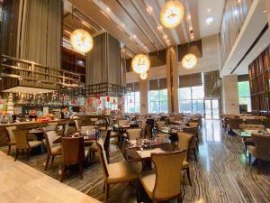 Um restaurante ou outro lugar para comer em Wanda Realm Huangshi