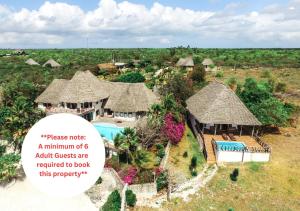 an aerial view of a resort with a pool at Zi Villa Main House in Matemwe