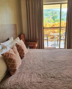 Un pat sau paturi într-o cameră la Vaea Hotel Samoa