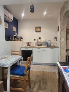 Kuchyň nebo kuchyňský kout v ubytování Il Rifugio