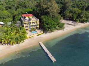 an aerial view of a hotel on a beach at Del Playa Penthouse #5 Condo in West End