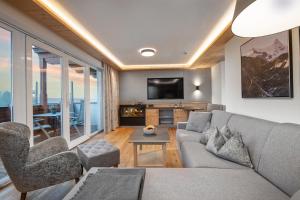 Sjónvarps- og/eða afþreyingartæki á Hotel Alpina Wellness & Spa Resort