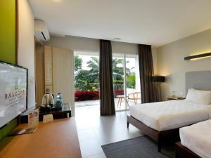 Voodi või voodid majutusasutuse The Balcone Suites & Resort toas