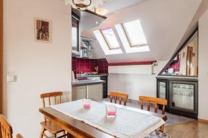 Kuchyňa alebo kuchynka v ubytovaní Rent like home - Kasprowicza