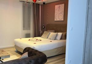 Katil atau katil-katil dalam bilik di Eden Spa ST Etienne