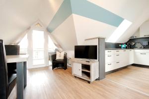 Kuchyň nebo kuchyňský kout v ubytování Lüerßen direkt am Steinhuder Meer