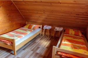 Postel nebo postele na pokoji v ubytování Mountain Lodge Jelje - Happy Rentals