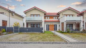 an image of a house at Apartamenty Sun & Snow Bursztynowa Polana in Ustka