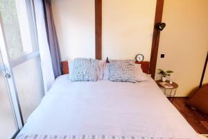 A bed or beds in a room at Daiichi Mitsumi Corporation - Vacation STAY 15356
