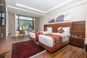 Letto o letti in una camera di Hotel 11 Boulevard