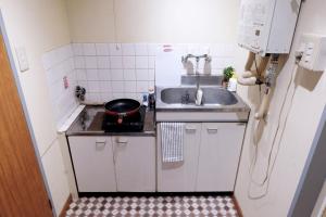 A kitchen or kitchenette at Daiichi Mitsumi Corporation - Vacation STAY 15351