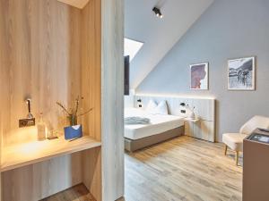 Postel nebo postele na pokoji v ubytování Hotel Balga Natur- und Bikehotel